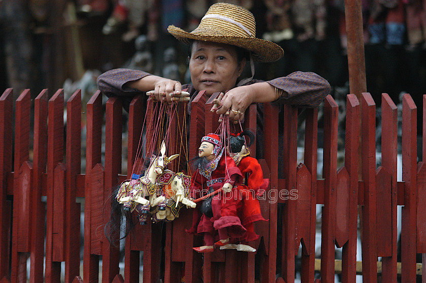 Burma - 00918 
 Central Manadalay - Shwenandaw Monastry and area 
 Keywords: Woman, Myanmar, Asia, Bagan, Street Seller, OCCUPATION, Burma, women, Portrait, female