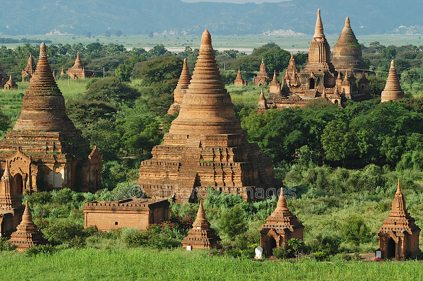 Burma - 00332 
 Bagan Plain - Temples of Bagan The spectacular plain of Bagan in which stand thousands of Stupas and Pahto (temples) adjacent to the Ayeyarwady (Irrawaddy) River 
 Keywords: religious building, Burma, Stupa, Asia, architecture, Bagan, Myanmar, Landscape, building, Ayeyarwady River