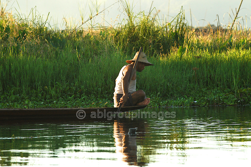 Burma - 01527 
 Inle Lake - Man on canoe 
 Keywords: Myanmar, male, Asia, Burma, Man