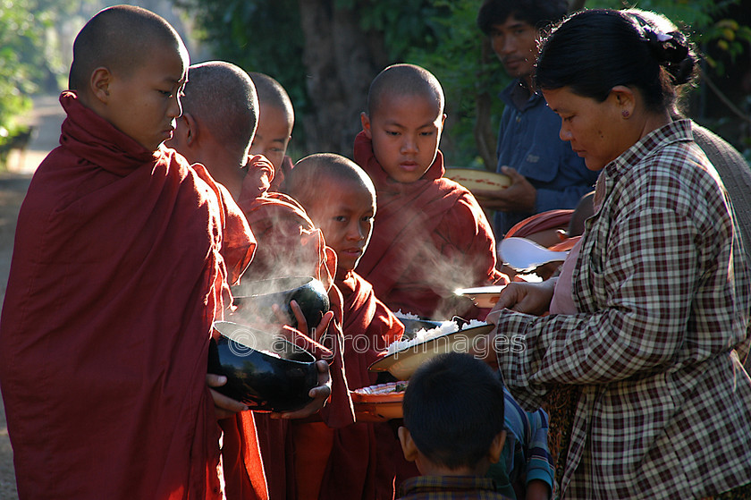 Burma - 01574v3 
 Inle Lake - Monks making morning food collection 
 Keywords: Asia, Burma, , Home, monk, Myanmar, OCCUPATION, PEOPLE, religion