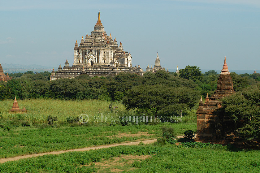 Burma - 00347 
 Bagan Plain - Temples of Bagan
Shwesandaw Paya - Built by King Anarahta circa 1057 - Views from top over the Bagan Plain The spectacular plain of Bagan in which stand thousands of Stupas and Pahto (temples) adjacent to the Ayeyarwady (Irrawaddy) River 
 Keywords: religious building, Stupa, architecture, Myanmar, building, Bagan, Asia, Ayeyarwady River, Burma, Landscape