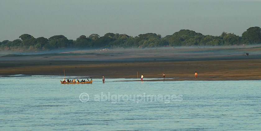 Burma - 01118 
 Taxi boat on Ayeyarwady River in the early morning 
 Keywords: Sunrise, Bagan, Asia, Myanmar, Ayeyarwady River, Burma