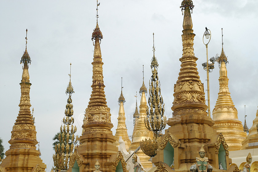 Burma - 00172 
 Gold shrine roofs at The Shwedagon Paya, Yangon. 
 Keywords: Burma, building, Myanmar, religion, religious building, Asia, Buddhism, Stupa, Yangon, architecture