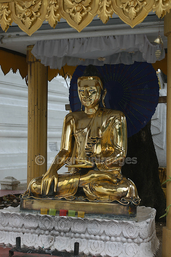 Burma - 00151 
 Gold Buddha at The Shwedagon Paya, Yangon. 
 Keywords: architecture, religious building, Yangon, religion, Myanmar, Burma, building, Buddhism, Asia