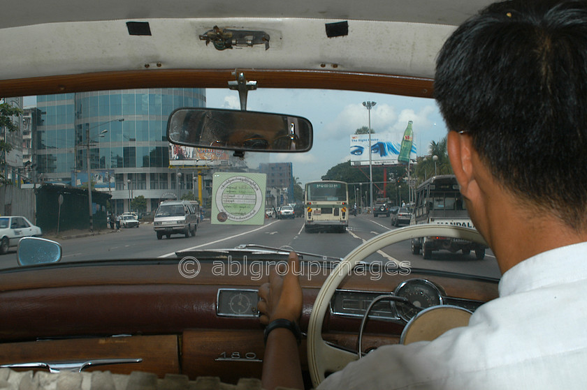 Burma - 00014 
 Yangon Taxi - Mercedes 180 in Central Yangon 
 Keywords: Yangon, Asia, Burma, taxi, Myanmar, taxi car