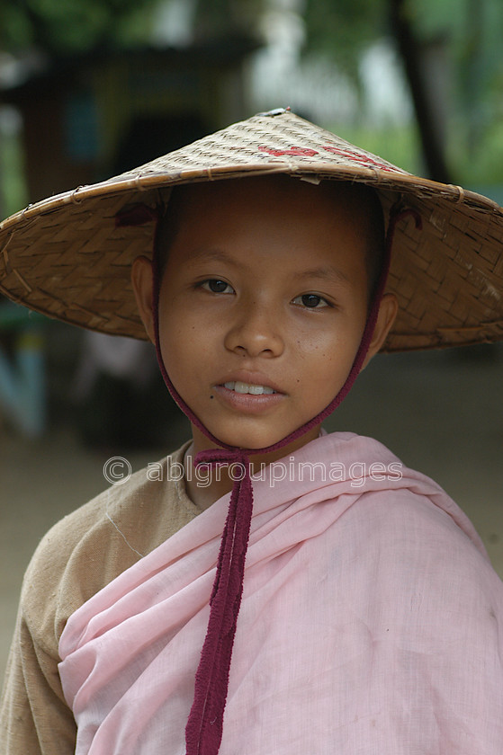 Burma - 00770 
 Portrait of a young nun, Mandalay - Mingun Tour 
 Keywords: nun, Bagan, Asia, Myanmar, religion, OCCUPATION, Burma, Girl, Portrait