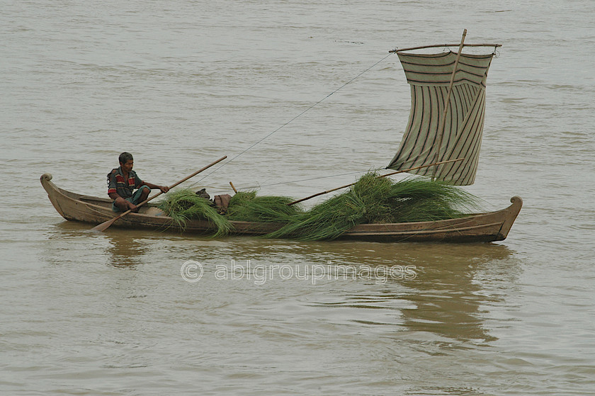 Burma - 00488 
 Sail boat with goods on way to market, Ayeyarwady River, Myanmar - Bagan - Mandalay 
 Keywords: water transportation, Burma, river boat, Myanmar, Asia, Ayeyarwady River, river boats, transportation, Bagan