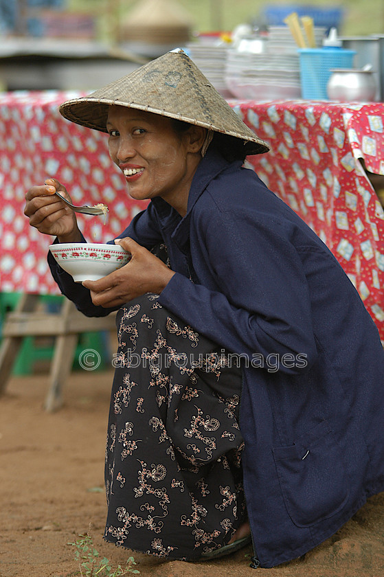 Burma - 00752 
 Mandalay - Mingun Tour 
 Keywords: Asia, Burma, eating, female, food, Myanmar, People, Woman