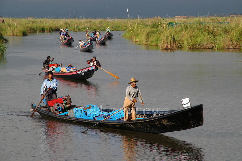 Burma - 01581 
 Inle Lake - canal with boats 
 Keywords: men, Asia, Myanmar, Burma, male