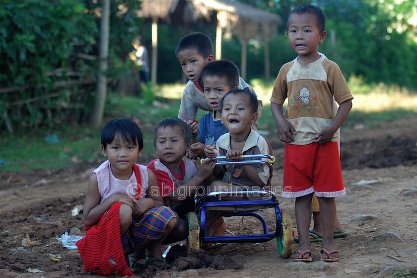 Burma - 01490 
 Inle Lake - Children watching the man with the camera! 
 Keywords: Myanmar, Children, Burma, Asia