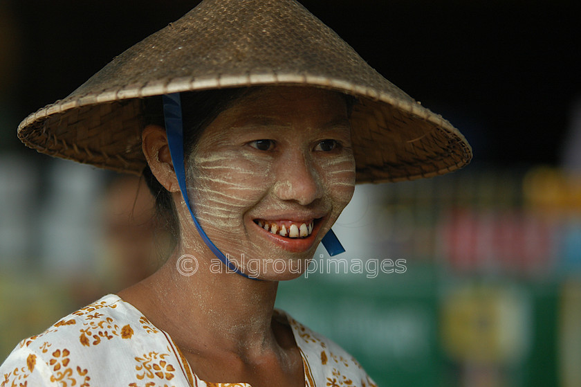 Burma - 00760 
 Portrait of a woman street seller Mandalay - Mingun Tour 
 Keywords: women, Bagan, Portrait, Street Seller, Asia, female, Woman, Myanmar, Burma