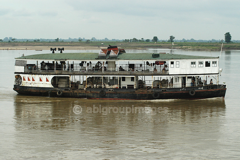 Burma - 00468 
 River Boat on Ayeyarwady River, Myanmar - Bagan - Mandalay 
 Keywords: Ayeyarwady River, transportation, Bagan, river boat, Myanmar, Asia, water transportation, river boats, Burma