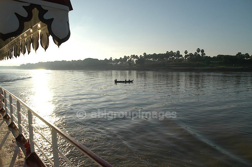 Burma - 01121 
 Ayeyarwady River as seen from the boat "Road to Mandalay" in the early morning 
 Keywords: Sunrise, Myanmar, Ayeyarwady River, Bagan, Asia, Burma