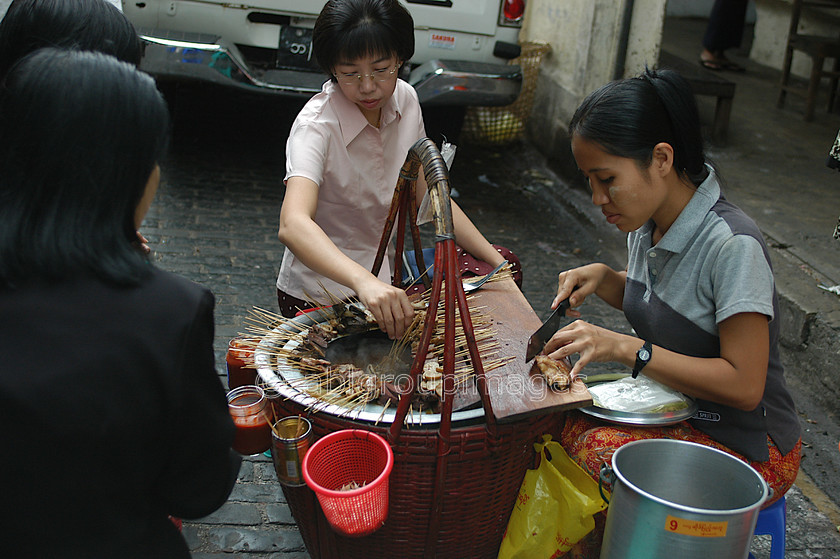 Burma - 00056 
 Food seller Bogyoke Aung San Market - 70 Year old Market (British Name: Scott Market) 
 Keywords: Myanmar, Asia, Burmese food, Asian food, Burma, Market, Yangon