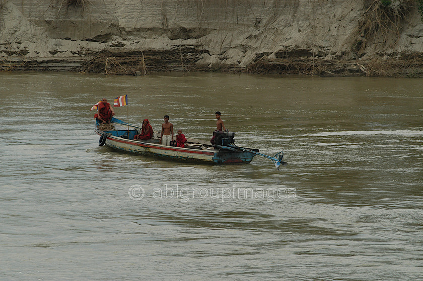 Burma - 00481 
 Monks on river boat taxi, Ayeyarwady River, Myanmar - Bagan - Mandalay 
 Keywords: Ayeyarwady River, river boats, transportation, water transportation, Bagan, monk, Asia, religion, Burma, Myanmar, OCCUPATION, river boat